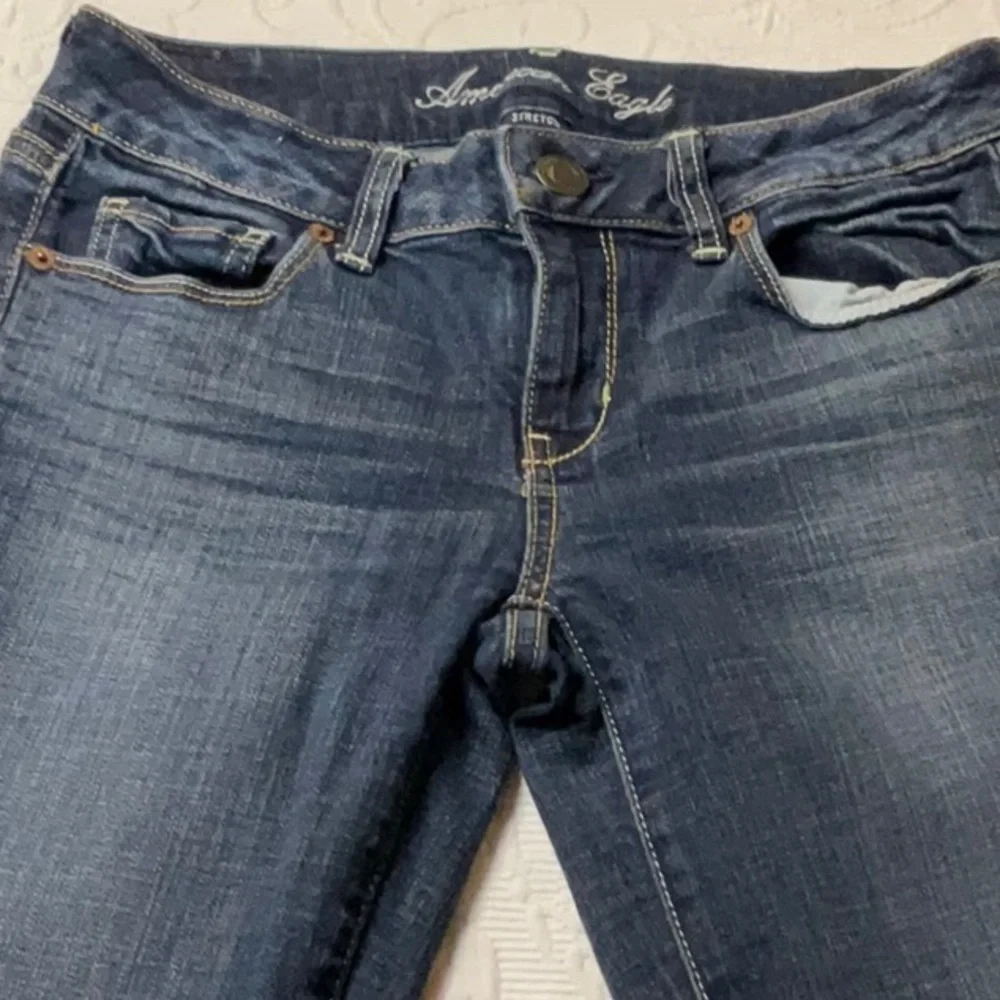 American Eagle Outfitters Women's Skinny Jeans - Dark Blue Wash Distressed.